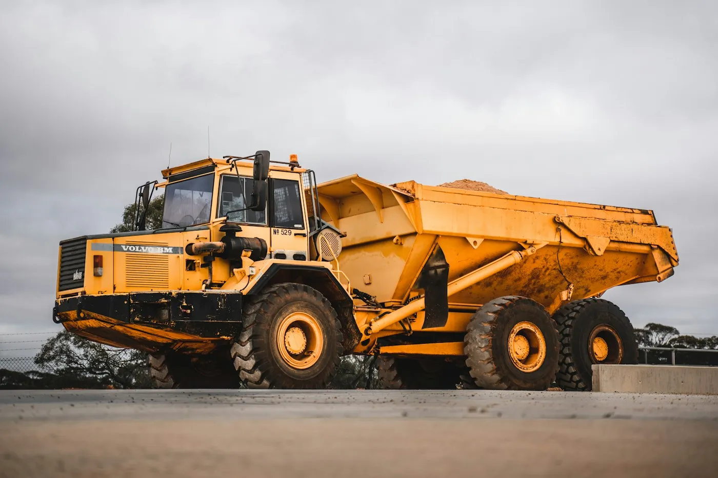 Articulated haul truck on a gravel surface